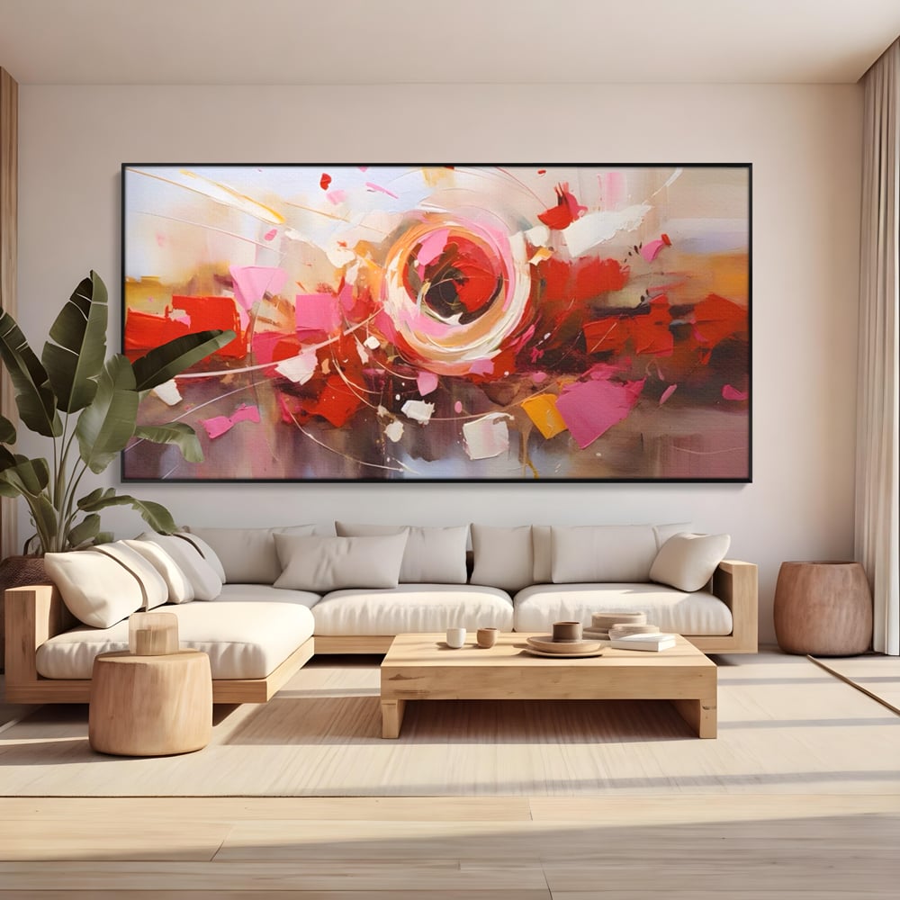 Tablou canvas cu tablou canvas cu floare abstracta si culori vibrante, in rama de aluminiu negru, pe perete intr-un living